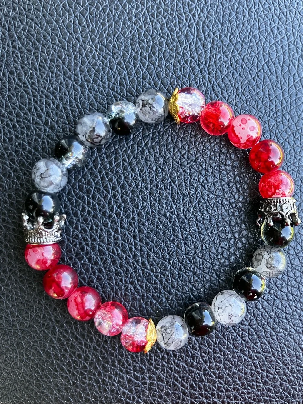 Black and red with black crown and gold accent glass beaded bracelet